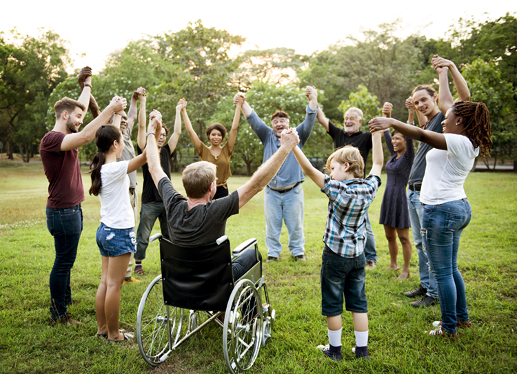 Group,Of,People,Holding,Hand,Together,In,The,Park