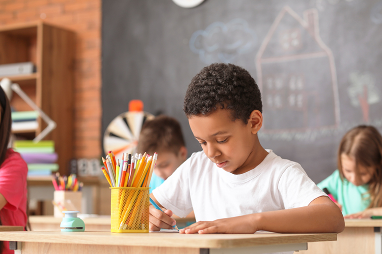 Cute,African-american,Boy,Drawing,At,School